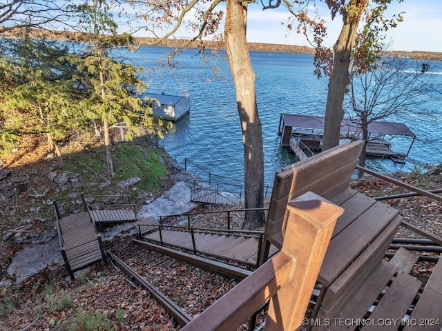 dock area with a water view