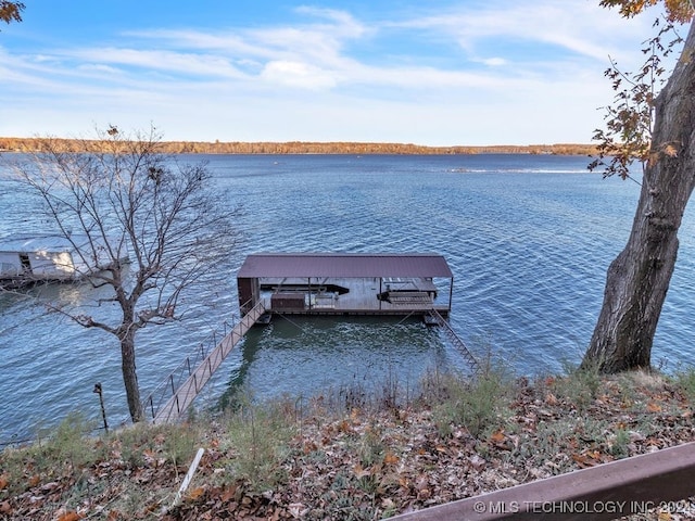 dock area featuring a water view