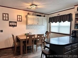 dining room with wood-type flooring