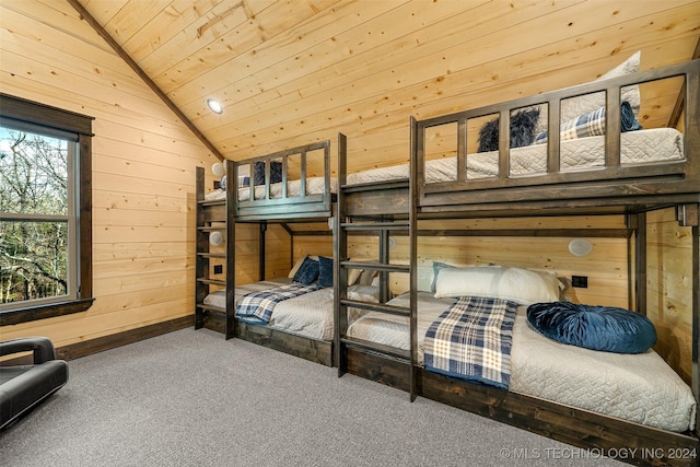 bedroom with carpet flooring, wood walls, lofted ceiling, and wood ceiling