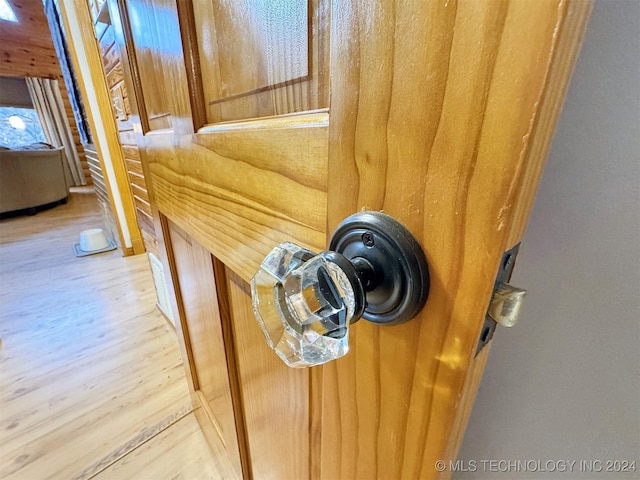 interior details featuring hardwood / wood-style flooring