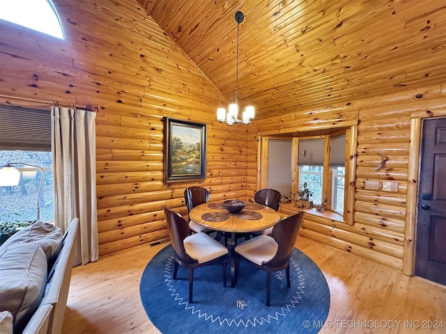 dining area featuring wooden ceiling, high vaulted ceiling, a healthy amount of sunlight, and light hardwood / wood-style floors