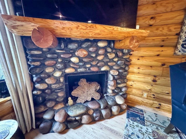 room details featuring a stone fireplace