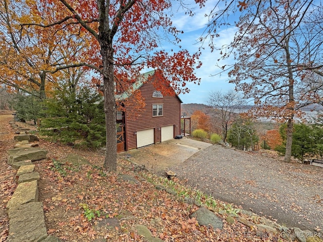 view of home's exterior featuring a garage