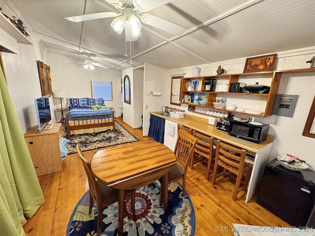 dining area featuring ceiling fan and light hardwood / wood-style floors