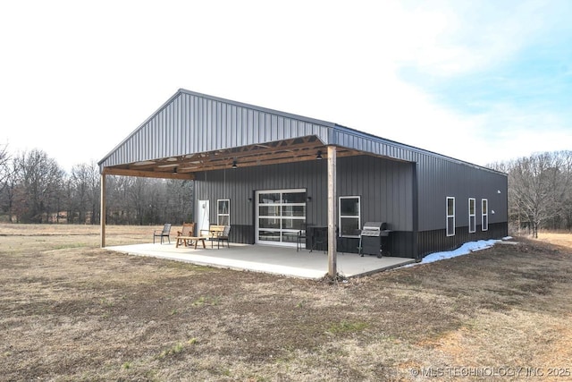 exterior space with a patio and a yard