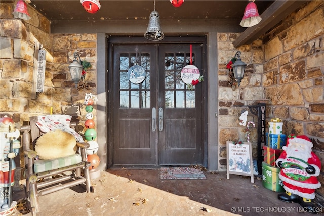 doorway to property with french doors