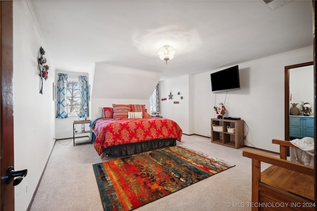 bedroom with crown molding, carpet, and lofted ceiling