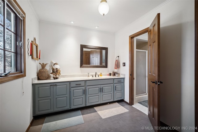 bathroom featuring vanity, walk in shower, and ornamental molding