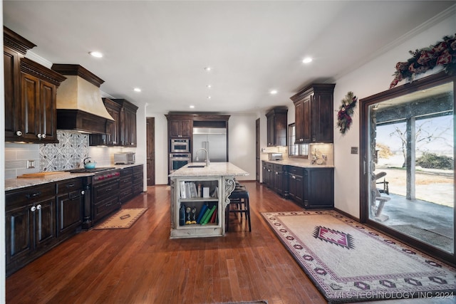 7133 S 425th Rd, Inola, OK 74036 - kitchen featuring tasteful backsplash, open shelves, appliances with stainless steel finishes, premium range hood, and ornamental molding