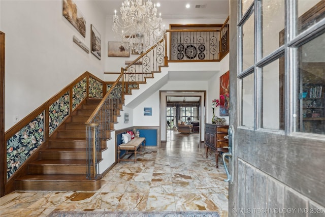 7133 S 425th Rd, Inola, OK 74036 - entrance foyer featuring stairway, a high ceiling, marble finish floor, visible vents, and a chandelier