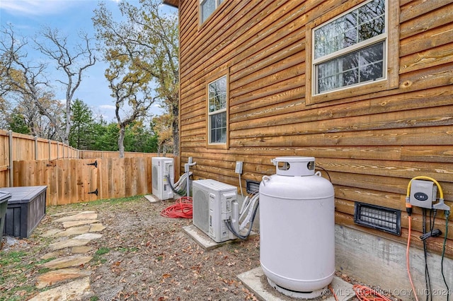 view of home's exterior with ac unit