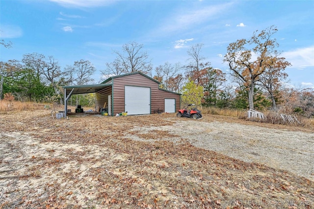 exterior space with a carport