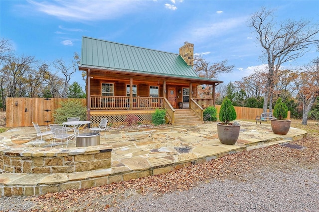 view of front of home with a patio area