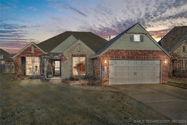 view of front of property with a garage