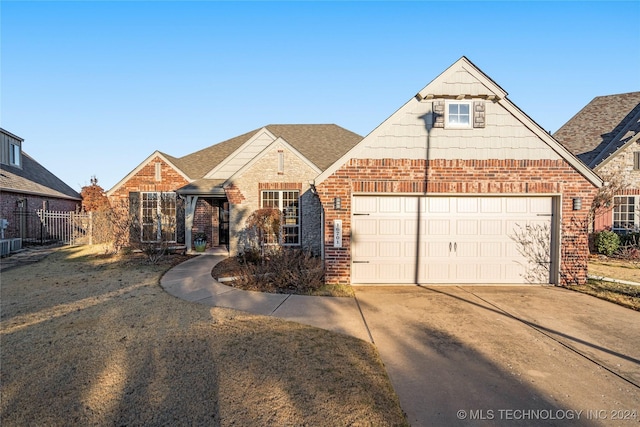 front of property with a garage