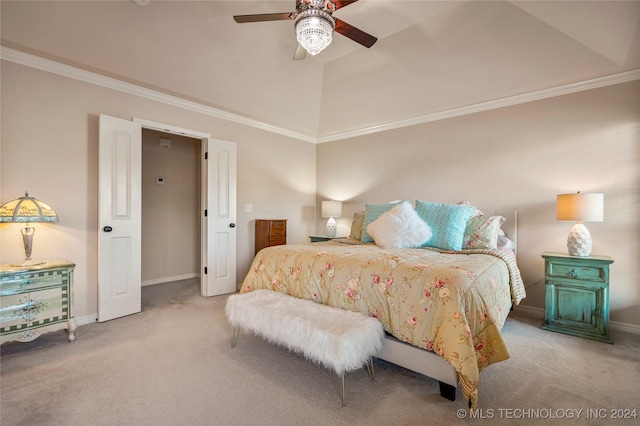 carpeted bedroom with ceiling fan and ornamental molding