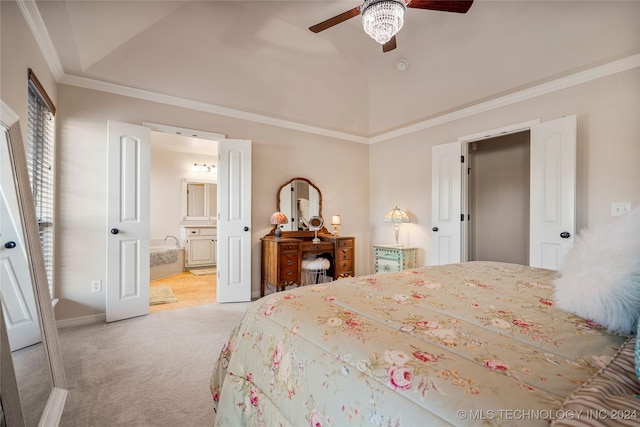 carpeted bedroom with ceiling fan, crown molding, and ensuite bath