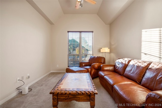 living room with ceiling fan, light colored carpet, and lofted ceiling