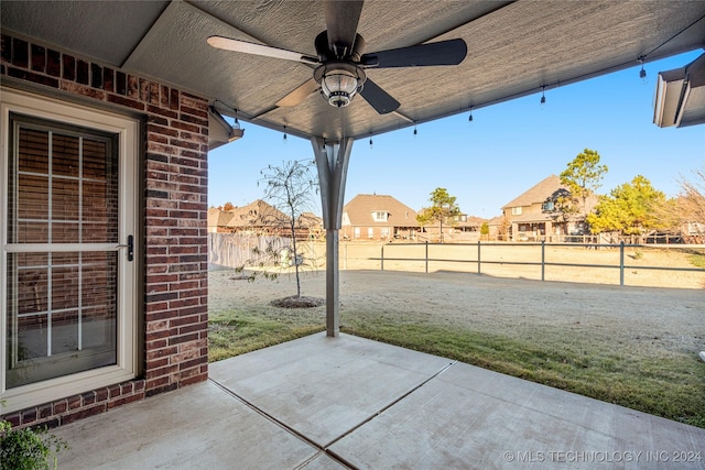 view of patio / terrace featuring ceiling fan