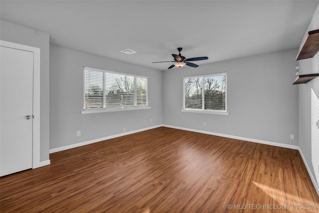 unfurnished room featuring wood-type flooring and ceiling fan