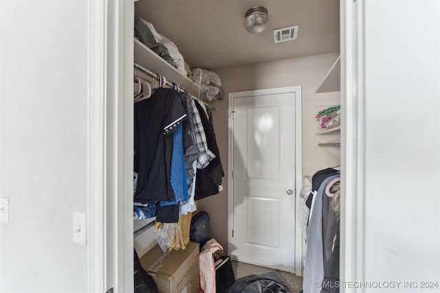 laundry room with carpet flooring