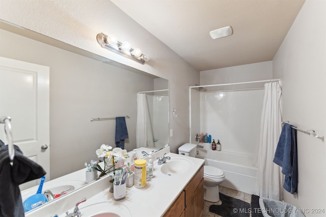 full bathroom featuring vanity, toilet, and shower / tub combo