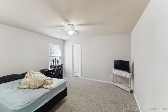 bedroom with carpet floors and ceiling fan