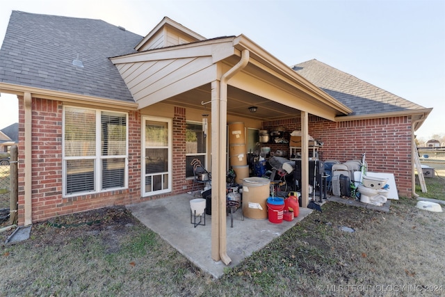 back of property featuring a patio area