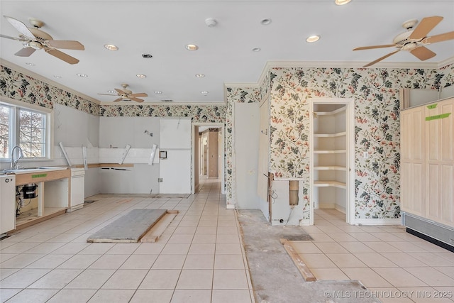 interior space with crown molding and light tile patterned flooring