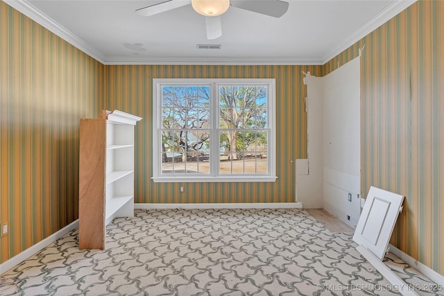 empty room with light colored carpet, ceiling fan, and ornamental molding