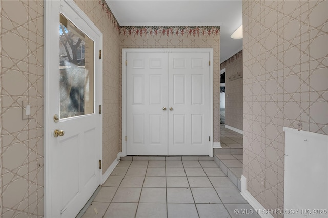 interior space with crown molding