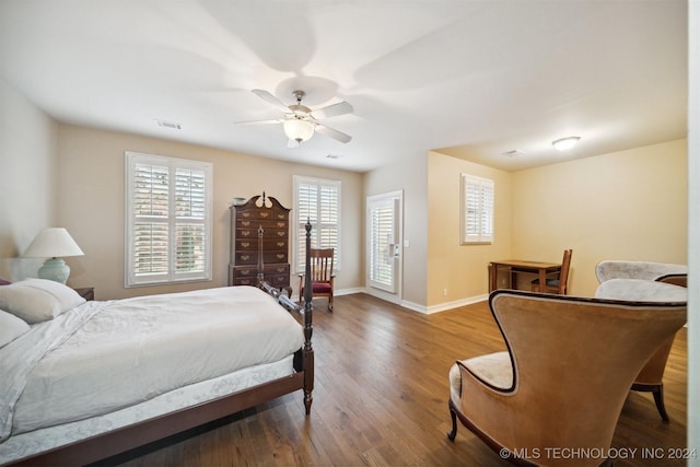 bedroom featuring hardwood / wood-style floors and ceiling fan