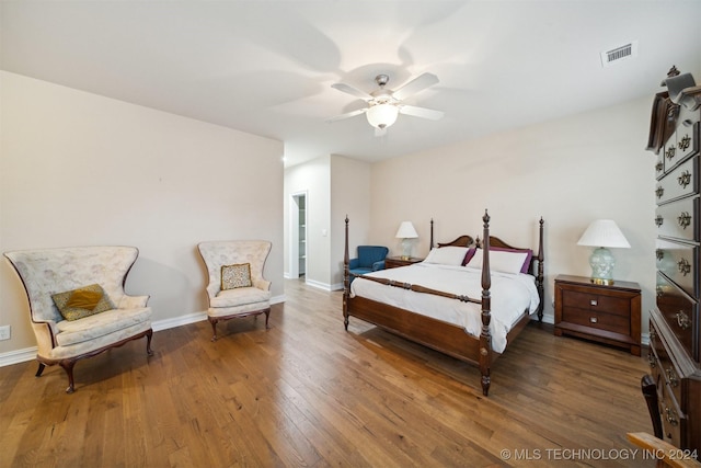 bedroom featuring hardwood / wood-style flooring and ceiling fan