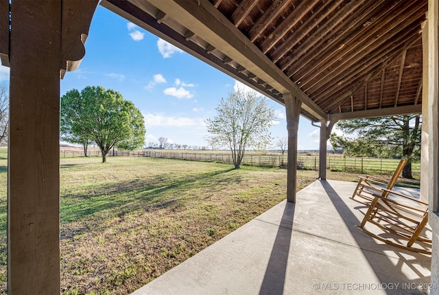 view of yard with a patio area and a rural view