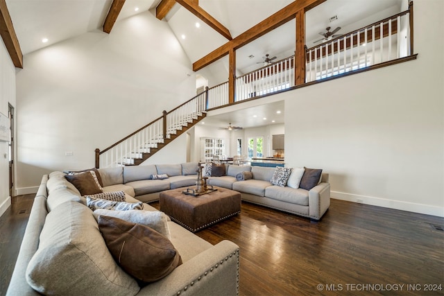 living room featuring beamed ceiling, high vaulted ceiling, ceiling fan, and dark wood-type flooring