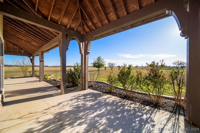 view of patio with a rural view