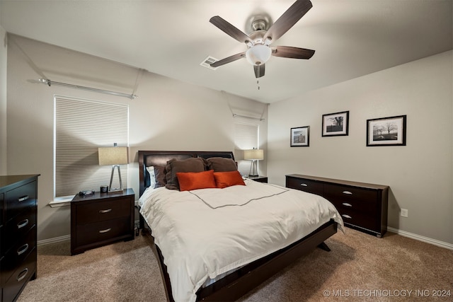 carpeted bedroom featuring ceiling fan