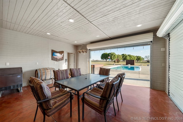 dining area featuring concrete floors