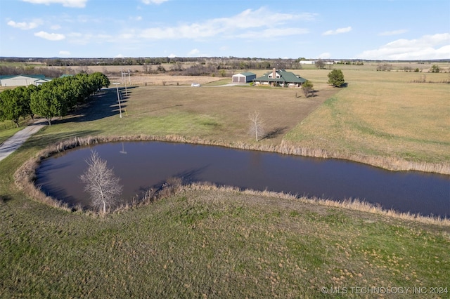 aerial view with a water view and a rural view