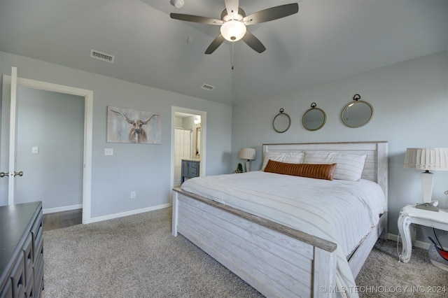 bedroom with carpet flooring, connected bathroom, and ceiling fan