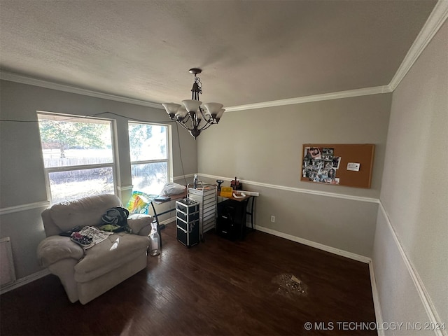 sitting room featuring a chandelier, crown molding, and dark wood-type flooring