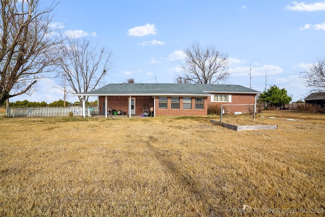 view of front of home with a front yard