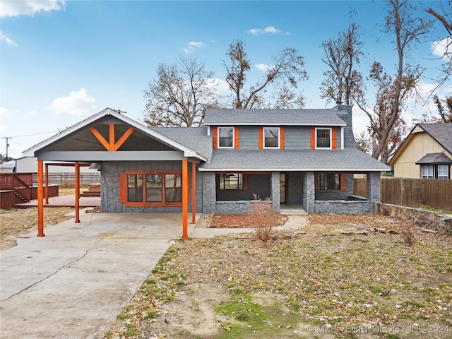 view of front of house with a carport