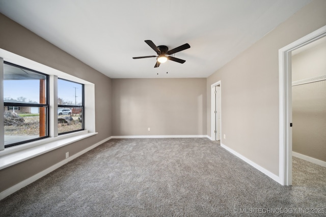 unfurnished bedroom featuring carpet floors and ceiling fan