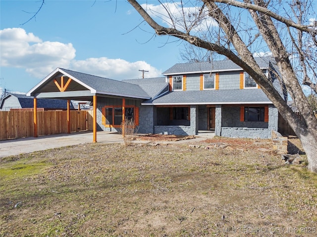 view of front facade featuring a carport and a porch