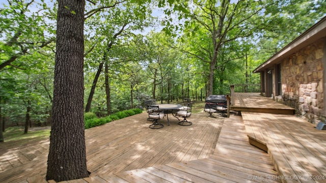 wooden deck with area for grilling