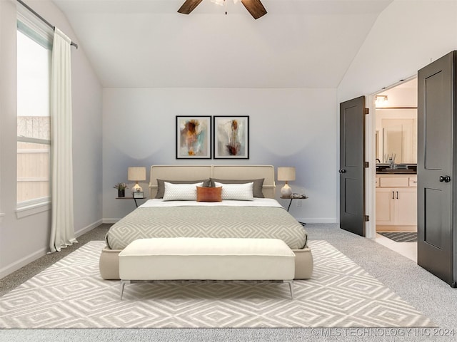 bedroom featuring ceiling fan, light colored carpet, and vaulted ceiling