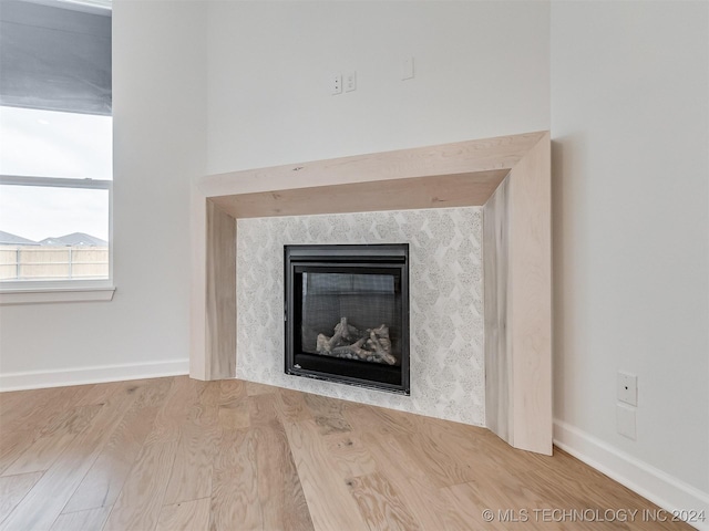 details featuring hardwood / wood-style floors