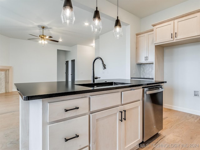 kitchen with ceiling fan, sink, dishwasher, pendant lighting, and light hardwood / wood-style floors